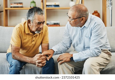 Men, sofa and support with friends in communication, hand gesture and grief with pain or loneliness. Elderly men, diversity and conversation on mental health or emotional counselling on sad with loss