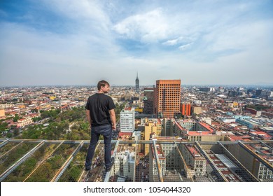 Men Standing On The Helipad On Roof Top Building, Mexico City