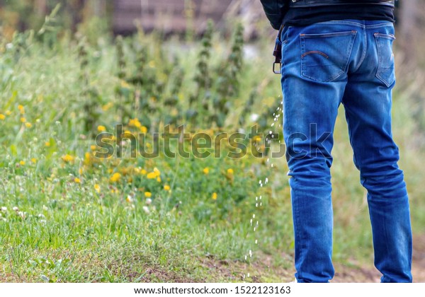 Men Standing On Sidewalk Peeing On Stock Photo (Edit Now) 1522123163