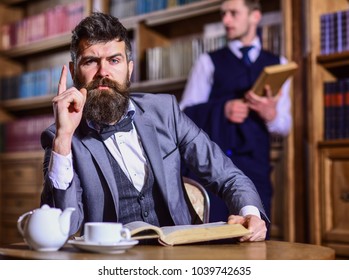 Men In Suit, Detectives Spend Leisure In Library. Private Investigator And Detective Concept. Man With Beard And Strict Face Found Out Riddle. Retro Detectives Work On Investigation In Antique Room.