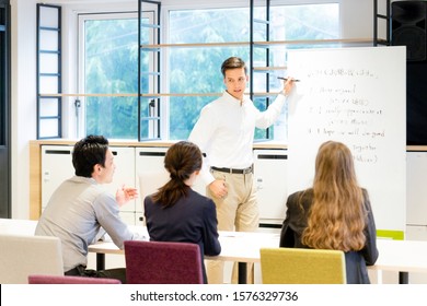 Men Teaching English In The Classroom (Japanese / English)