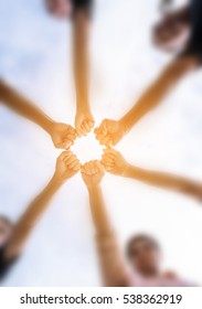 Men Team Put All Hands Together Under Blur Background, Circle Shape Hand Of Team