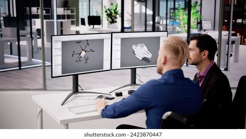 Men Using 3D CAD Software On Computer Screen