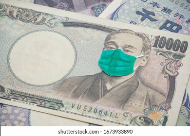 Men Wear Face Mask On Japanese Yen Bill Banknote Background. Global Novel Coronavirus (Covid-19) Outbreak Effect To Japan And World Economy, Financial Crisis, Travel Hotel Business, Tokyo Olympic 2020