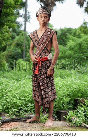 men wear traditional clothes from Sabu island, east nusa tenggara, Indonesia