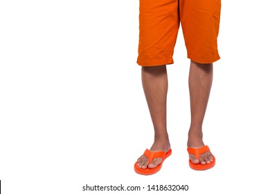 Men wearing orange shorts and orange sandals isolated on white background.Concepcion is a casual dress for holiday or tourism.