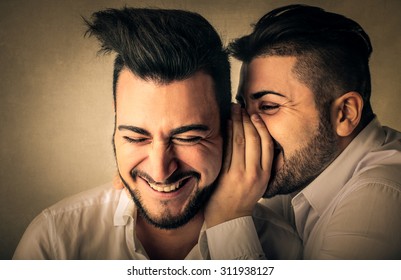 Men Whispering Secrets