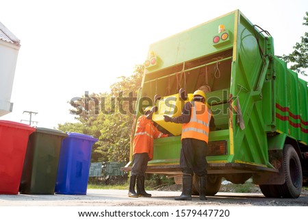Men who dispose of rubbish that works for public benefit, empty trash container of the Thai Public Health Division in Asia