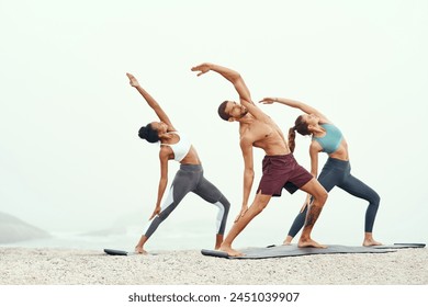 Men, woman and yoga on beach with stretching balance or mindfulness with chakra, wellness or friends. People, arms and morning mist at ocean or pilates warm up for calm self care, exercise or group - Powered by Shutterstock