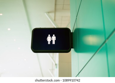 Men and women toilet or restrooms signs at the airport