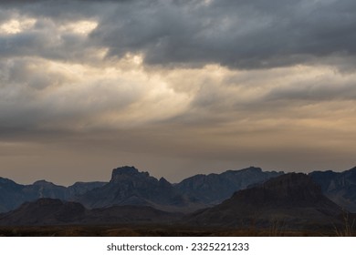 Menacing Clouds Hang Over The Chisos Mountains In Big Bend at sunrise