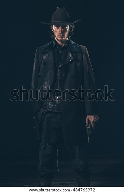 Menacing Vintage 1900 Cowboy Standing Revolver Stock Photo (Edit Now ...