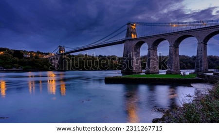 Menai Bridge, Wales - November 1, 2022:  Menai Bridge at night, Anglesey, Wales