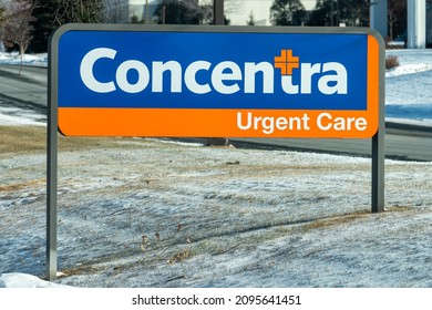 MENDOTA HEIGHTS, MN, USA - DECEMBER 22, 2021: Concentra Urgent Care Clinic Exterior And Trademark Logo.