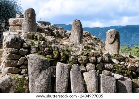 Menhirs with a human face carved on the megalithic site of Filitosai, southern Corsica, France