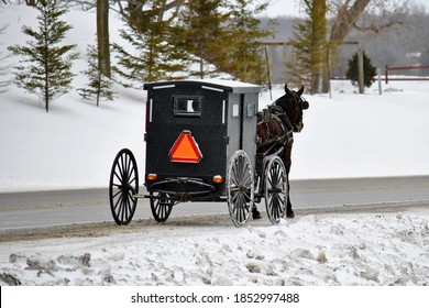 A Mennonite Horse And Buggy Photographed On A Winter Afternoon In Ontario.