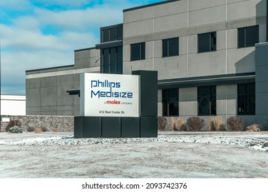 MENOMINEE, WI, USA - DECEMBER 18, 2021: Molex Phillips-Medisize Manufacturing Facility  And Trademark Logo.