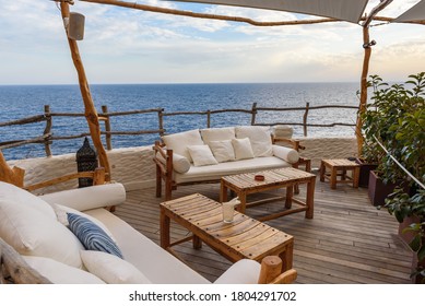 Menorca, Spain - October 14, 2019: Terrace Of Cafe Bar In The Caves On The Island Of Menorca, Spain