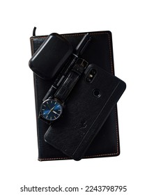Men's accessories with black leather watch pen smartphone and black notepad - Shutterstock ID 2243798795