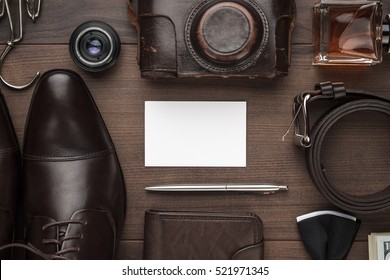 Men's Accessories And Blank Business Card Mockup On The Brown Wooden Table