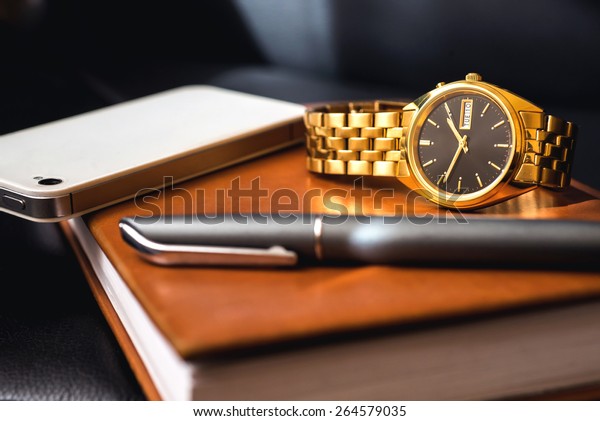 golden mobile watch