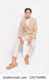 Men's Beauty, Fashion. Handsome Full Body Young Man In Shirts With Suit With Khaki Pants , And Brown Casual Shoes