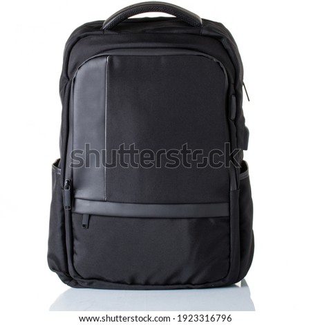 Men's black backpack made of textile. Isolated on a white background