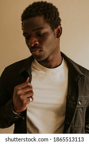 Men's Black Jeans Jacket Mockup On African American Male Model In Studio Shot