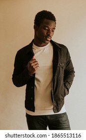 Men's Black Jeans Jacket Mockup On African American Male Model In Studio Shot