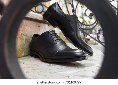 Men's Black Leather Dress Shoes On The Steps