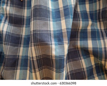 Mens Blue, White, And Gray Check Swimming Shorts - Creased And Crumpled At Different Angles