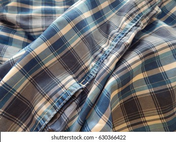 Mens Blue, White, And Gray Check Swimming Shorts - Creased And Crumpled At Different Angles