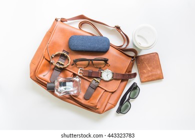 Men's Brown Leather Bag With Accessories, Flat Lay, Top View Background