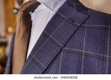 Men's Casual Checkered Tweed Coat And Blue Shirt Lapel With Tie Closeup