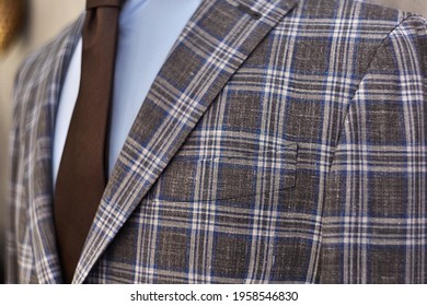 Men's Casual Checkered Tweed Grey Coat And Blue Shirt Lapel With Tie Closeup