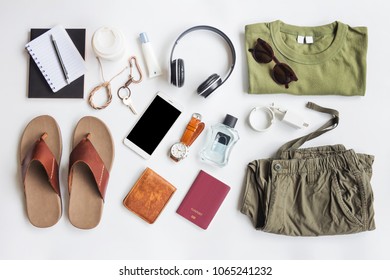 Men's casual outfits with accessories items on white background, lifestyle holiday traveler concept, flat lay fashion and beauty - Shutterstock ID 1065241232