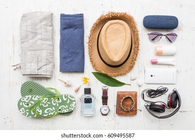 Men's Casual Summer Clothes With Accessories Items On White Rustic Wooden Board Background, Overhead Top View, Flay Lay