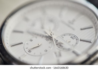 Men's classic watch (clock) on the table.