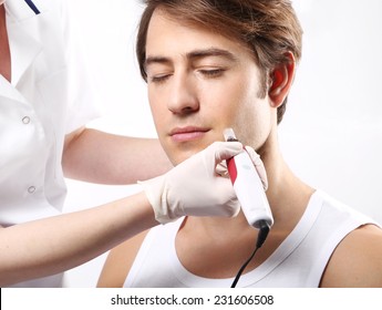 Men's Cleanser Anti Wrinkle Treatment Micro Needle Mesotherapy.Portrait Of A Young Man Groomed During The Treatment In The Beauty Salon