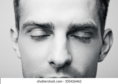Men's eyes closed
