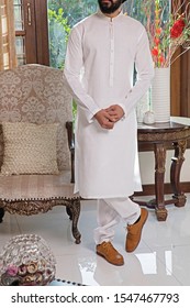 Men's Fabric Kurta, Shalwar Kameez, Cotton, Boski, Karandi Latest Embroidered Style With Beautiful Modeling And Photography.