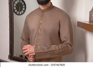 Men's fabric kurta, shalwar kameez, cotton, boski, karandi latest embroidered style with beautiful modeling and photography.
