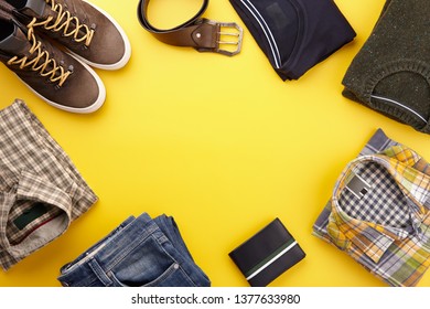 Mens Fall Casual Clothing Outfits And Accessories Flat Lay On Yellow Background, Top View