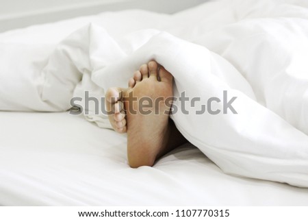 Men's feet in a white blanket. - Stock image
Leg, Foot, Sleeping, Human Foot, Human Leg  closeup