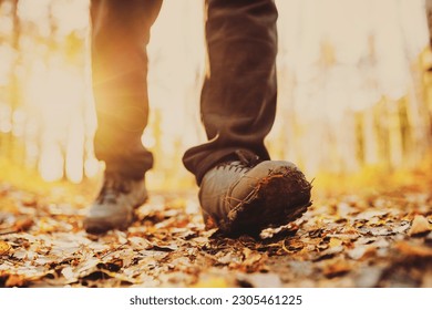 men's footsteps in the countryside in autumn 