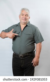 Men's Formal Shirt Mockup - Elderly Man Pointing At His Casual Shirt- Hispanic Male Worker