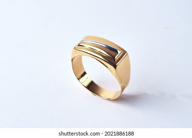 Men's Gold Ring On A White Background