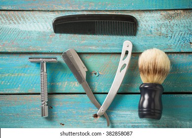 Mens Grooming Tools On A Blue Background