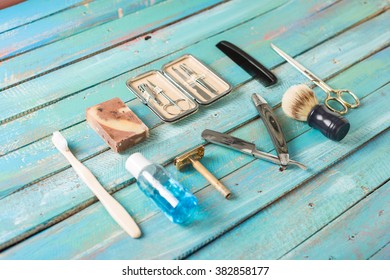 Mens Grooming Tools On A Blue Background