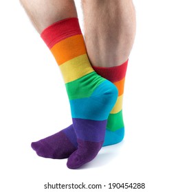 Mens Hairy Legs In Colored Striped Socks Fun. Isolate On White